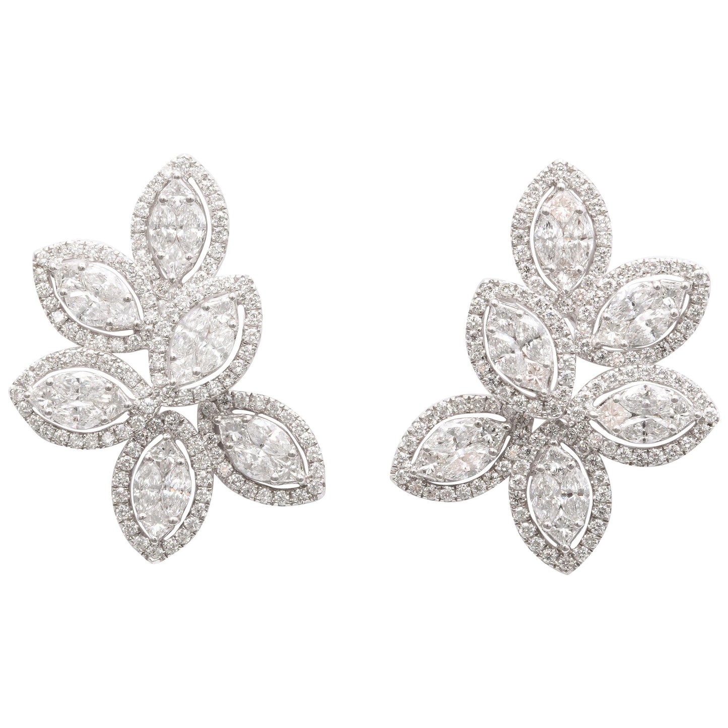 https://a.1stdibscdn.com/diamond-cluster-earrings-for-sale/1121189/j_101668421597892067953/10166842_master.jpg