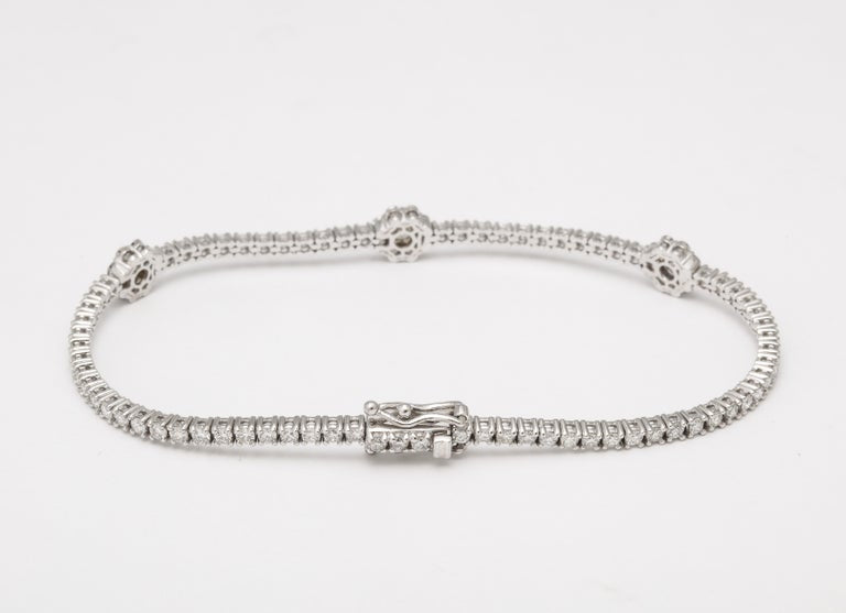 https://a.1stdibscdn.com/flower-diamond-tennis-bracelet-for-sale-picture-10/j_415/j_216140721705596571224/6R1A0171_master.jpg?width=768