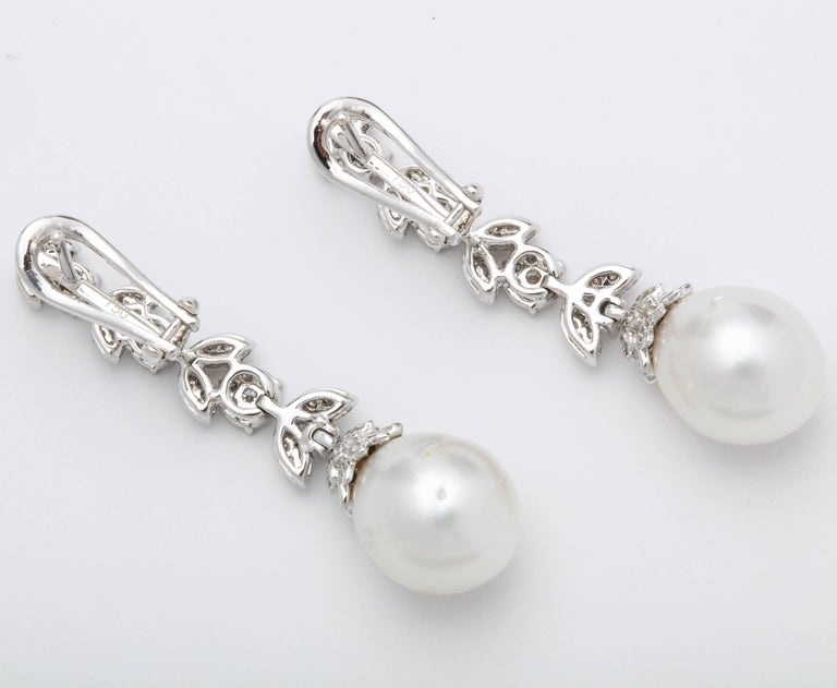 https://a.1stdibscdn.com/pearl-and-diamond-earrings-for-sale-picture-5/j_415/j_193187421684333968250/6R1A3819_master.jpg?width=768