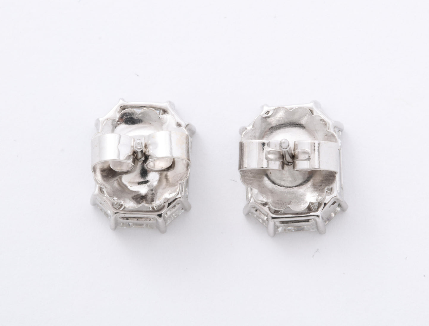 https://a.1stdibscdn.com/emerald-cut-diamond-studs-illusion-set-for-sale-picture-5/j_415/j_162413621656353997983/6R1A5046_master.jpg