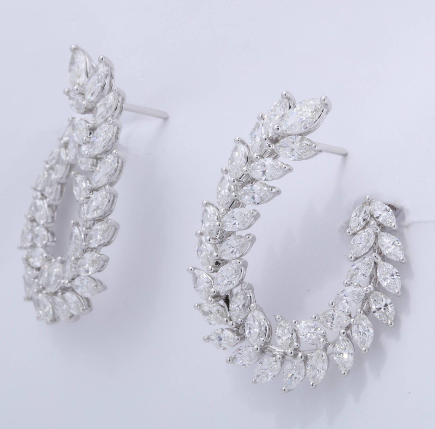 https://a.1stdibscdn.com/marquise-diamond-swirl-earring-for-sale-picture-8/0/j_45216831530288151893/6R1A9129_master.jpg
