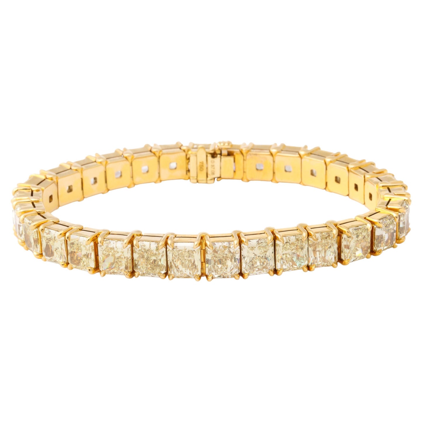 https://a.1stdibscdn.com/radiant-cut-yellow-diamond-bracelet-for-sale/j_415/j_161975821655912033262/j_16197582_1655912034300_bg_processed.jpg