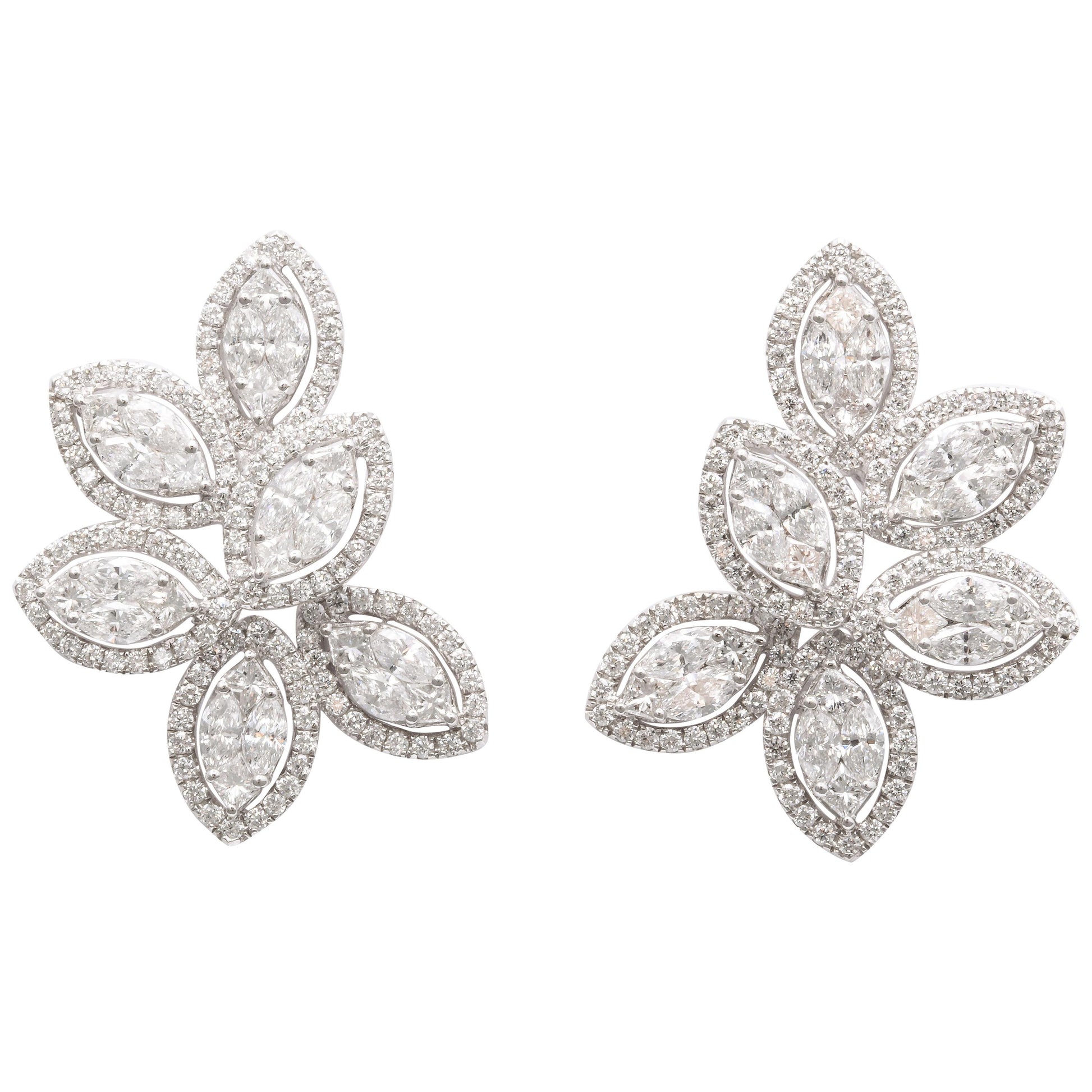 https://a.1stdibscdn.com/diamond-cluster-earrings-for-sale/1121189/j_101668421597892067953/10166842_master.jpg