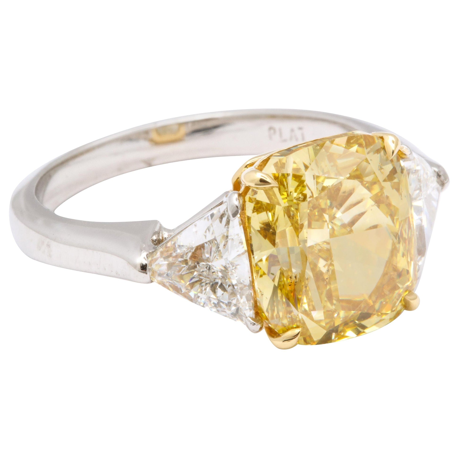 https://a.1stdibscdn.com/gia-certified-4-carat-fancy-intense-yellow-diamond-ring-for-sale/1121189/j_102693621606431225570/10269362_master.jpg