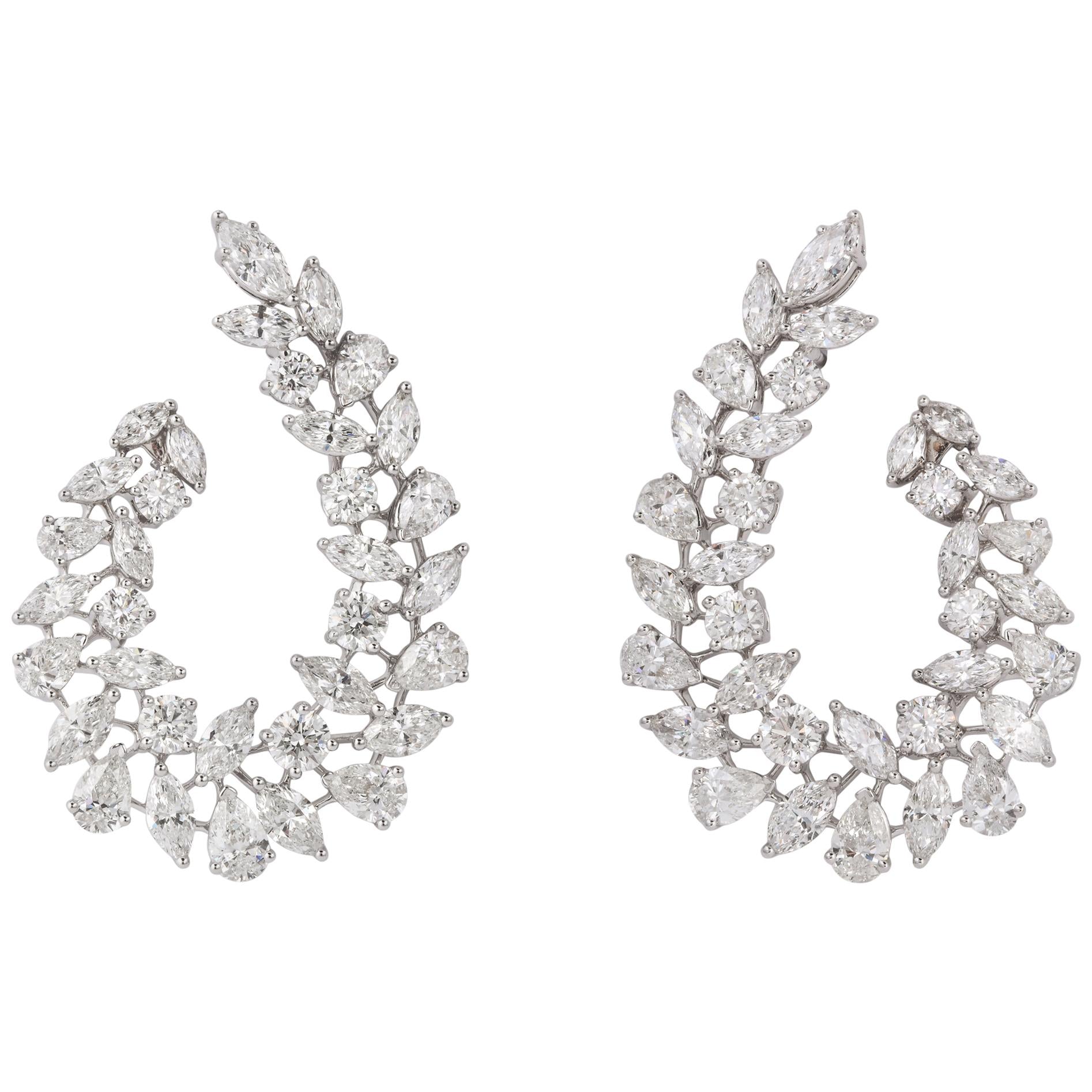 https://a.1stdibscdn.com/multishape-diamond-swirl-earring-for-sale/1121189/j_109518721606896931944/10951872_master.jpg