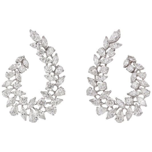 https://a.1stdibscdn.com/multishape-diamond-swirl-earring-for-sale/1121189/j_109518721606896931944/10951872_master.jpg
