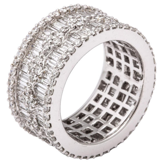 https://a.1stdibscdn.com/wide-baguette-and-round-diamond-band-for-sale/1121189/j_109519721607081718258/10951972_master.jpg?width=768