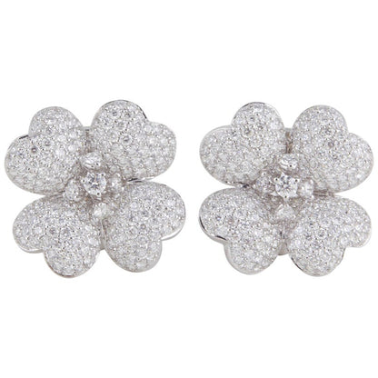 https://a.1stdibscdn.com/diamond-white-gold-flower-earrings-for-sale/1121189/j_114510421612563540772/11451042_master.jpg?width=768