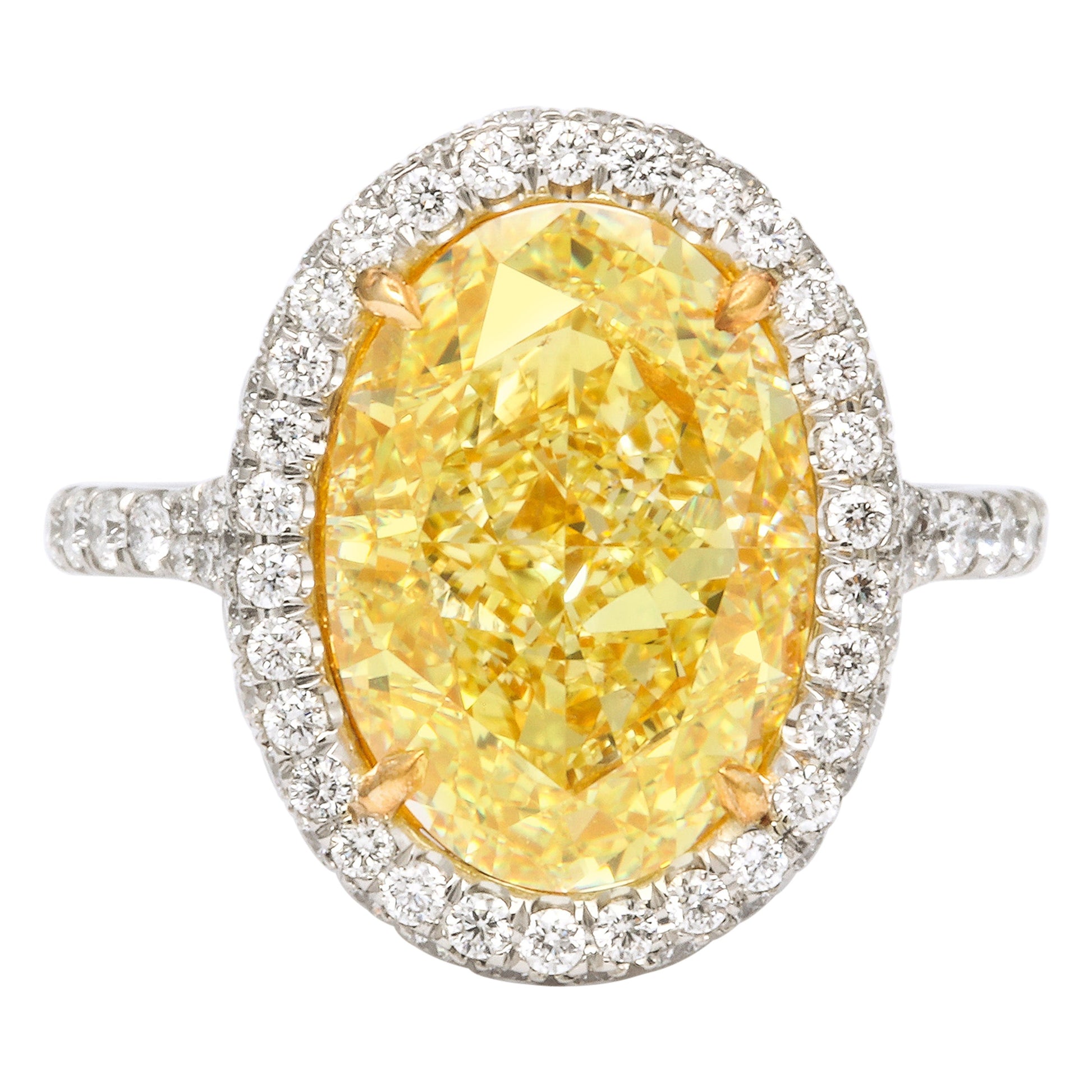 https://a.1stdibscdn.com/gia-certified-5-carat-oval-fancy-yellow-diamond-ring-for-sale/1121189/j_129688521628321975691/12968852_datamatics.jpg