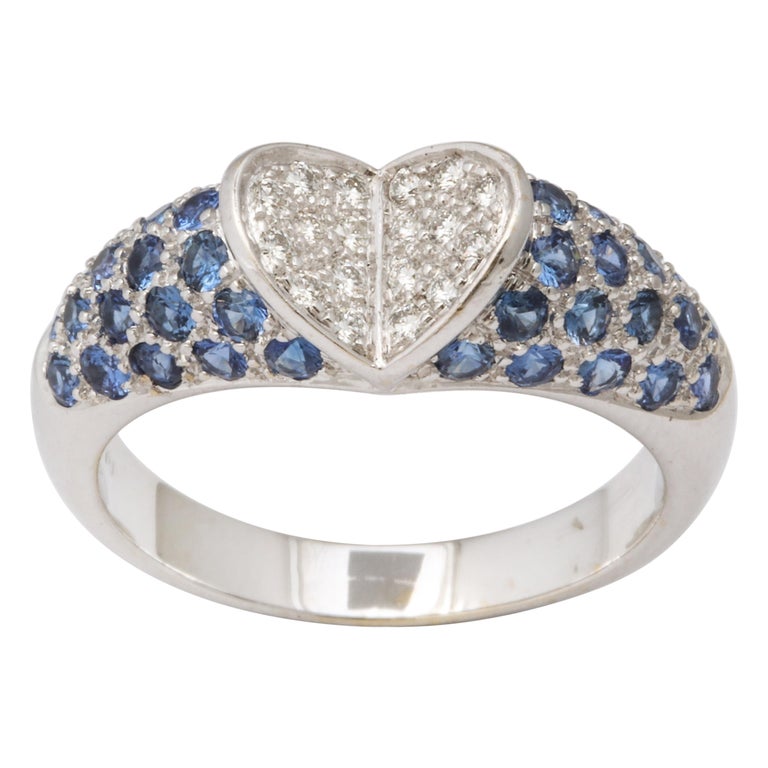 https://a.1stdibscdn.com/blue-sapphire-and-diamond-heart-ring-for-sale/1121189/j_133715121632252004504/13371512_datamatics.jpg?width=768