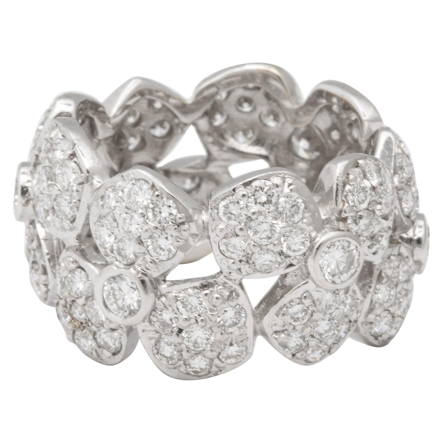 https://a.1stdibscdn.com/wide-diamond-flower-band-for-sale/1121189/j_133715621633770917186/13371562_datamatics.jpg