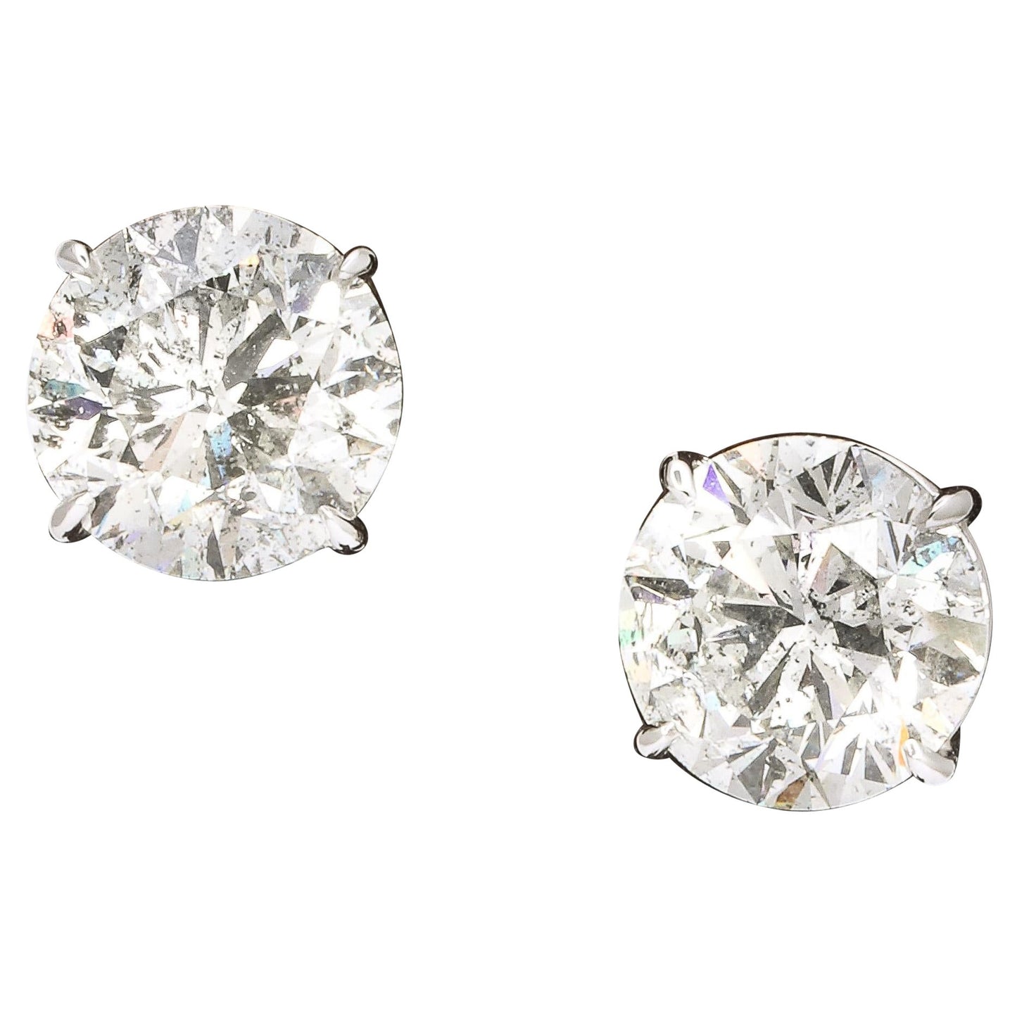 https://a.1stdibscdn.com/10-carat-each-round-diamond-stud-earrings-for-sale/1121189/j_133716321637992618423/13371632_datamatics.jpg