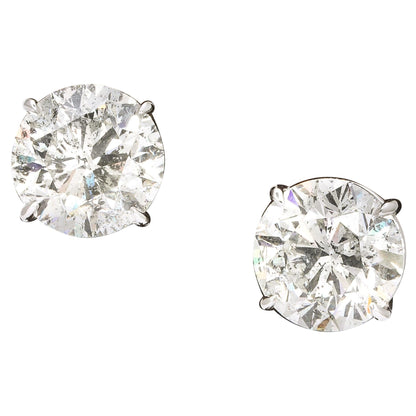 https://a.1stdibscdn.com/10-carat-each-round-diamond-stud-earrings-for-sale/1121189/j_133716321637992618423/13371632_datamatics.jpg