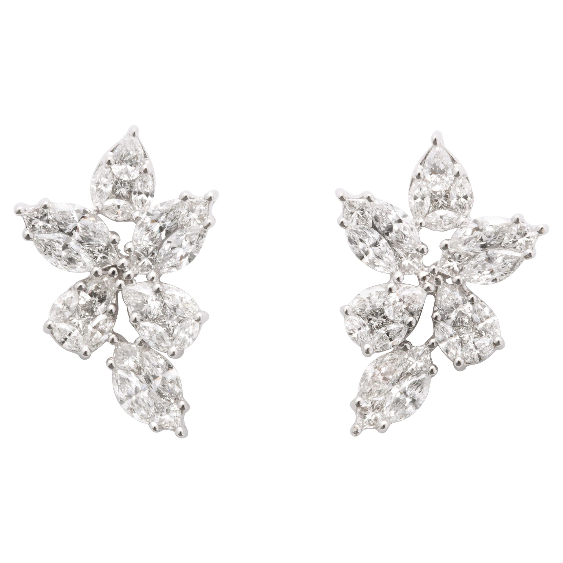 https://a.1stdibscdn.com/diamond-cluster-earrings-for-sale/1121189/j_140275621637996243762/14027562_datamatics.jpg