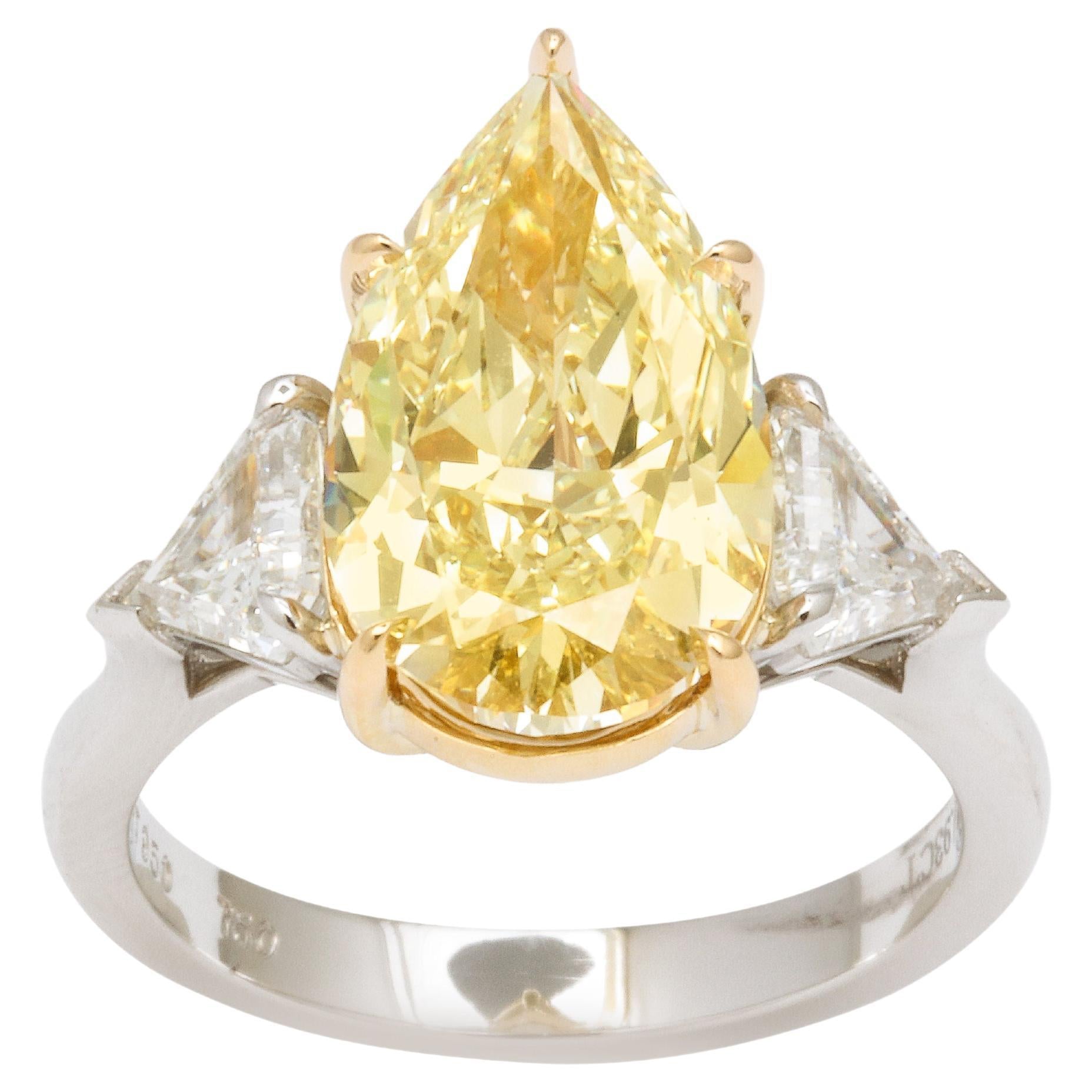 https://a.1stdibscdn.com/fancy-yellow-pear-shape-yellow-diamond-ring-for-sale/1121189/j_167935021673087016782/16793502_datamatics.jpg