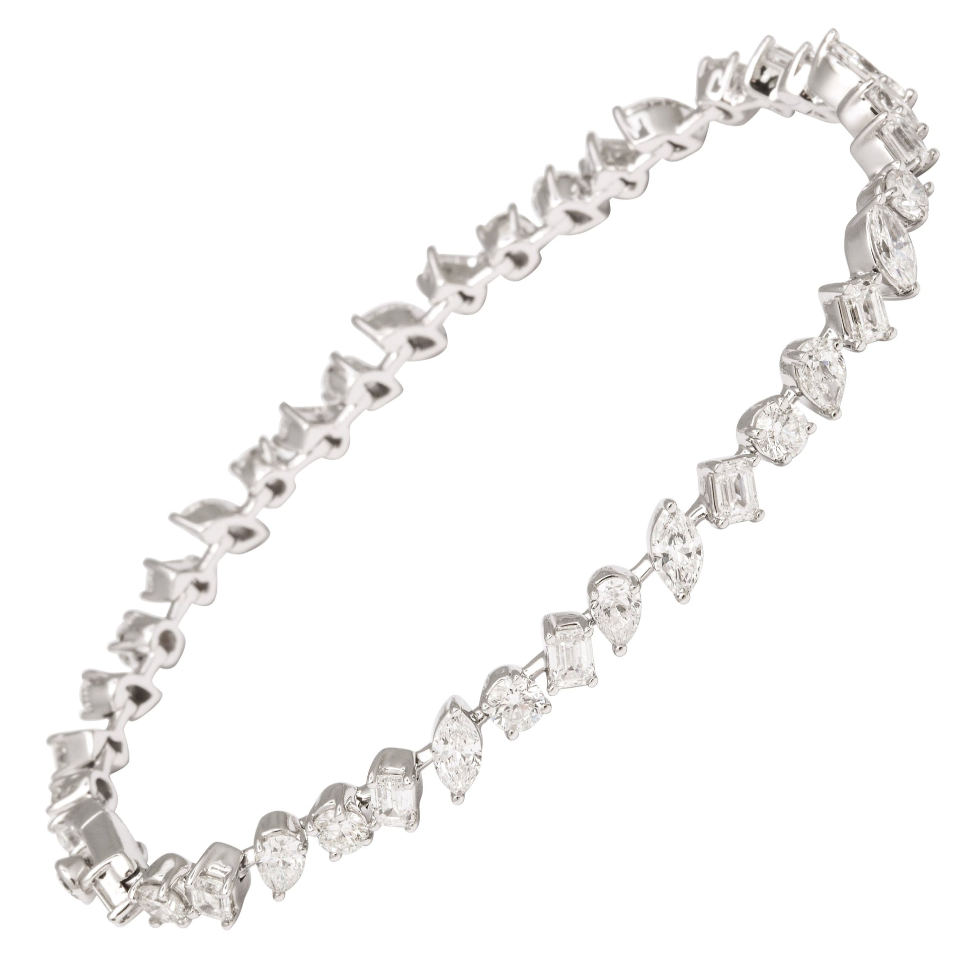 https://a.1stdibscdn.com/multi-shape-diamond-bracelet-for-sale/1121189/j_168335721662743194758/16833572_datamatics.jpg
