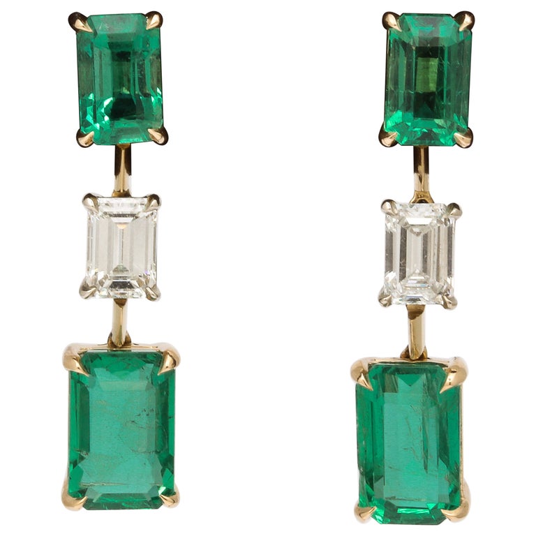 https://a.1stdibscdn.com/emerald-and-diamond-dangle-drop-earrings-for-sale/1121189/j_180977921673529477299/18097792_datamatics.jpg?width=768
