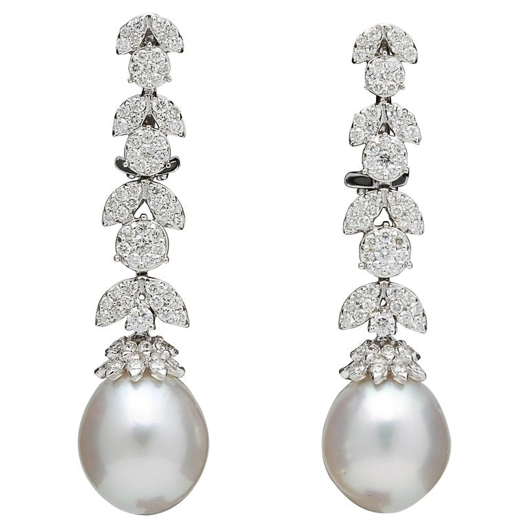 https://a.1stdibscdn.com/pearl-and-diamond-earrings-for-sale/1121189/j_193187421684498780626/19318742_datamatics.jpg?width=768