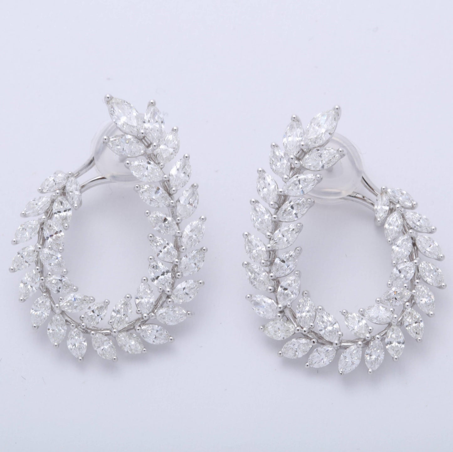 https://a.1stdibscdn.com/marquise-diamond-swirl-earring-for-sale-picture-2/0/j_45216831530288138950/1_main-4_master.jpg