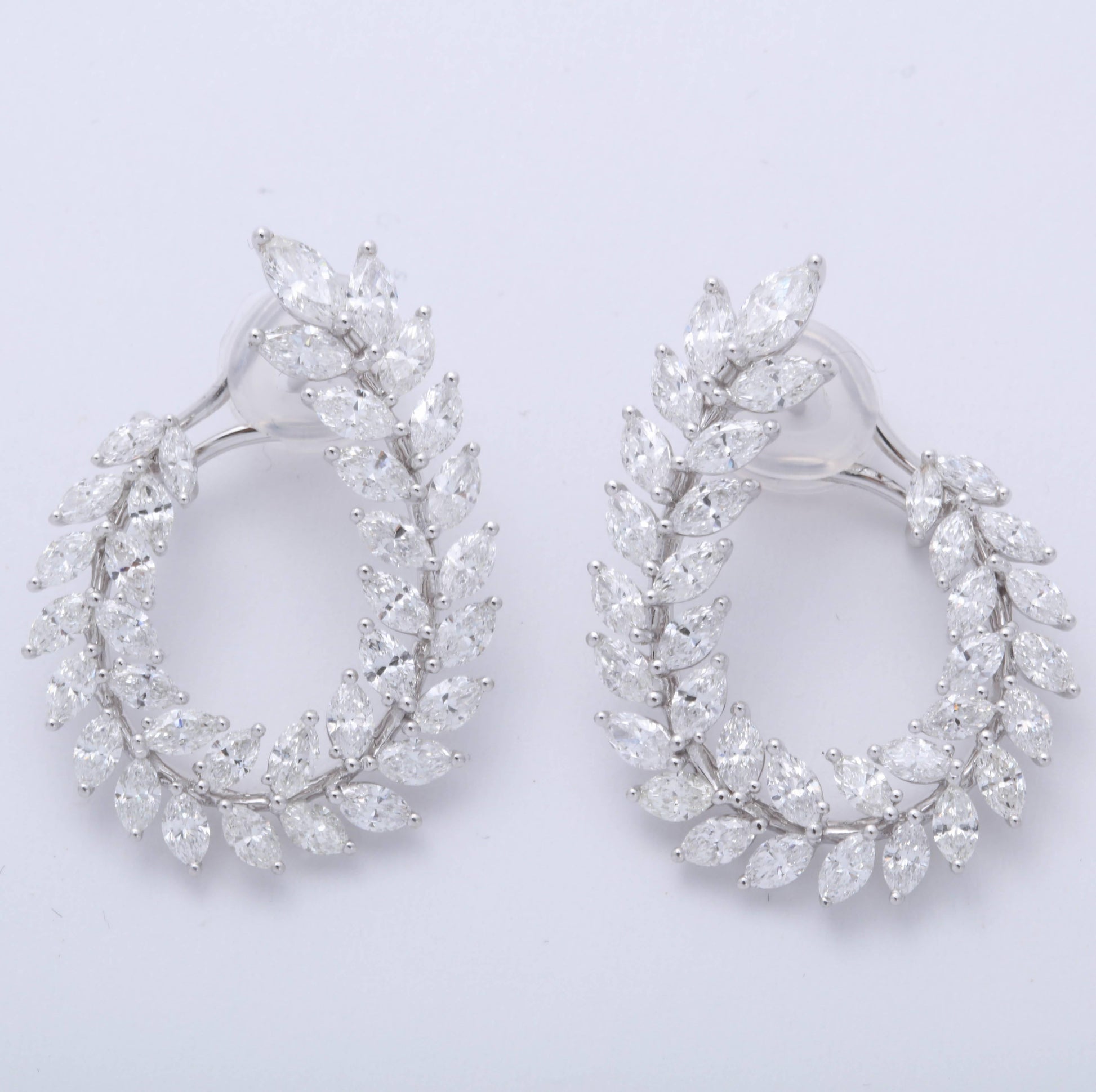https://a.1stdibscdn.com/marquise-diamond-swirl-earring-for-sale-picture-2/0/j_45216831530288138950/1_main-4_master.jpg