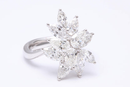 https://a.1stdibscdn.com/diamond-cluster-ring-for-sale-picture-4/0/j_50847211539355648332/1_main-5_master.jpg
