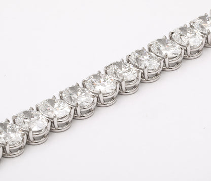 https://a.1stdibscdn.com/oval-diamond-tennis-bracelet-for-sale-picture-4/j_415/j_232203621718980089769/2P6A1413_master.jpg