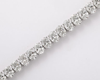 https://a.1stdibscdn.com/oval-diamond-tennis-bracelet-for-sale-picture-5/j_415/j_232203621718980090105/2P6A1416_master.jpg