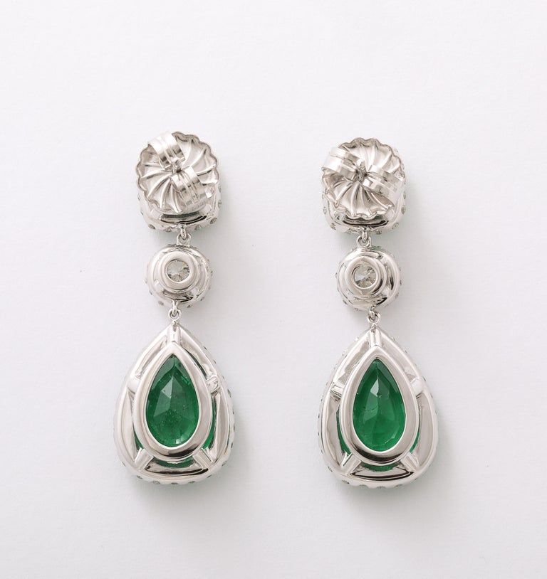 https://a.1stdibscdn.com/emerald-and-diamond-drop-earrings-for-sale-picture-4/j_415/j_229928921717078771895/2P6A1497_master.jpg?width=768