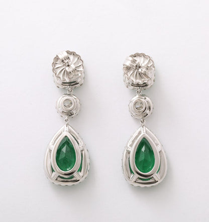 https://a.1stdibscdn.com/emerald-and-diamond-drop-earrings-for-sale-picture-4/j_415/j_229928921717078771895/2P6A1497_master.jpg?width=768