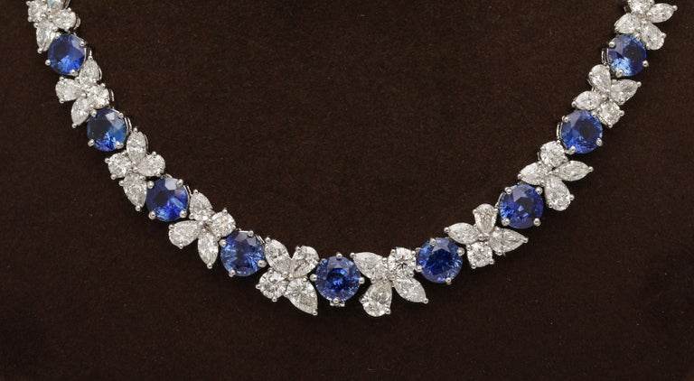 https://a.1stdibscdn.com/blue-sapphire-and-diamond-necklace-for-sale-picture-4/j_415/j_227289521714486587706/2P6A1549_master.jpg?width=768