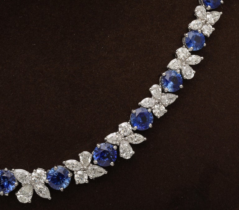 https://a.1stdibscdn.com/blue-sapphire-and-diamond-necklace-for-sale-picture-5/j_415/j_227289521714486587720/2P6A1550_master.jpg?width=768