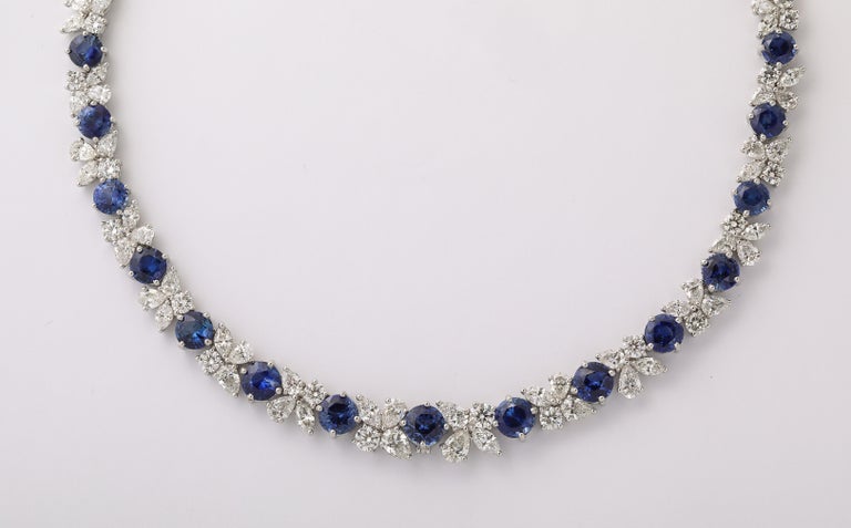 https://a.1stdibscdn.com/blue-sapphire-and-diamond-necklace-for-sale-picture-6/j_415/j_227289521714486587721/2P6A1551_master.jpg?width=768