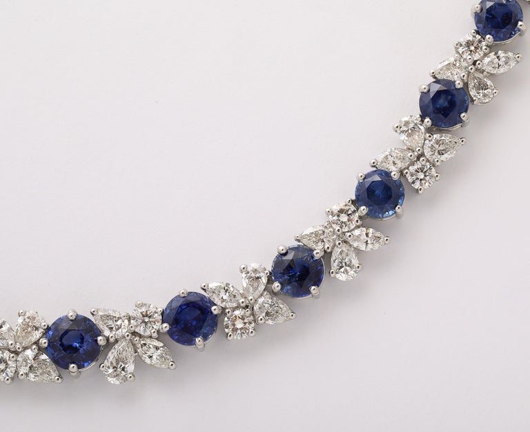 https://a.1stdibscdn.com/blue-sapphire-and-diamond-necklace-for-sale-picture-7/j_415/j_227289521714486587771/2P6A1552_master.jpg?width=768