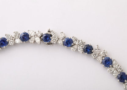 https://a.1stdibscdn.com/blue-sapphire-and-diamond-necklace-for-sale-picture-8/j_415/j_227289521714486591947/2P6A1553_master.jpg?width=768