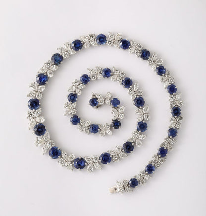 https://a.1stdibscdn.com/blue-sapphire-and-diamond-necklace-for-sale-picture-10/j_415/j_227289521714486591986/2P6A1555_master.jpg?width=768