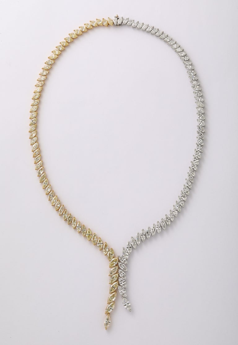 https://a.1stdibscdn.com/yellow-and-white-diamond-marquise-necklace-for-sale-picture-2/j_415/j_225040021712330451748/2P6A1574_master.jpg?width=768
