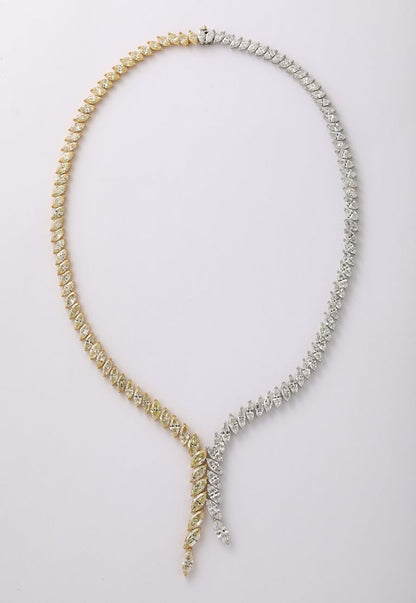 https://a.1stdibscdn.com/yellow-and-white-diamond-marquise-necklace-for-sale-picture-2/j_415/j_225040021712330451748/2P6A1574_master.jpg?width=768