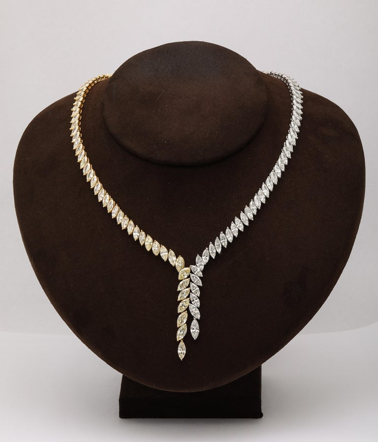 https://a.1stdibscdn.com/yellow-and-white-diamond-marquise-necklace-for-sale-picture-3/j_415/j_225040021712330451429/2P6A1575_master.jpg?width=768