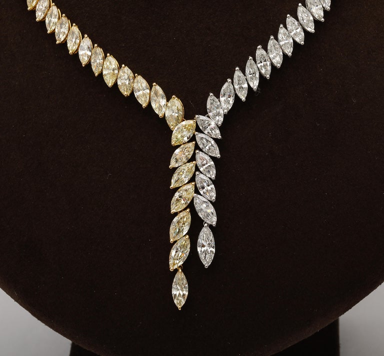 https://a.1stdibscdn.com/yellow-and-white-diamond-marquise-necklace-for-sale-picture-14/j_415/j_225040021712330455787/2P6A1586_master.jpg?width=768