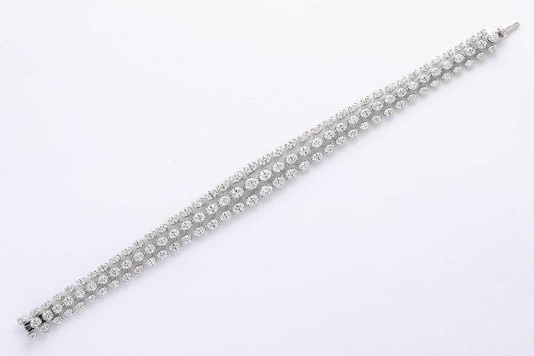 https://a.1stdibscdn.com/three-row-oval-diamond-bracelet-for-sale-picture-2/j_415/j_262309421747144390274/2P6A4464_master.jpg?width=768