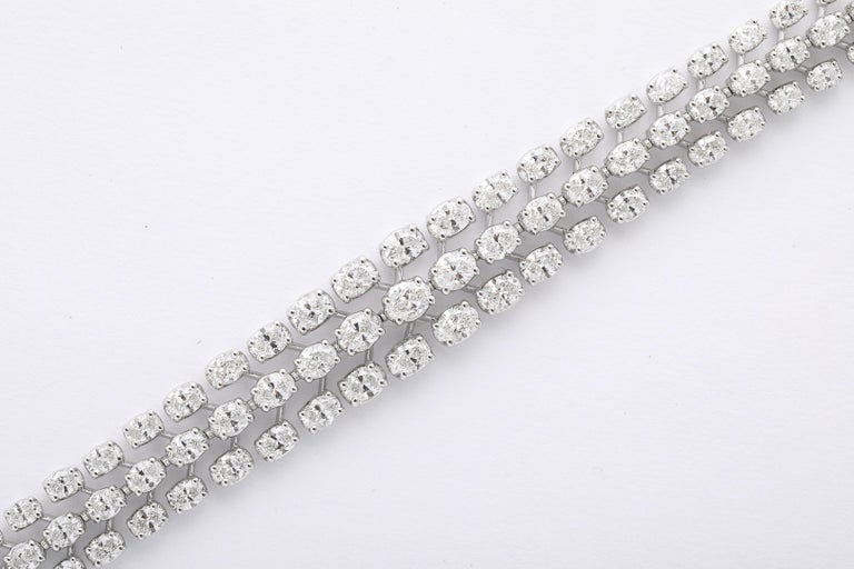 https://a.1stdibscdn.com/three-row-oval-diamond-bracelet-for-sale-picture-3/j_415/j_262309421747144390410/2P6A4465_master.jpg?width=768