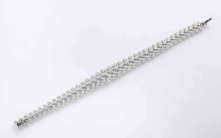 https://a.1stdibscdn.com/three-row-oval-diamond-bracelet-for-sale-picture-4/j_415/j_262309421747144390363/2P6A4466_master.jpg?width=768