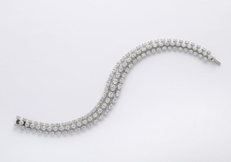 https://a.1stdibscdn.com/three-row-oval-diamond-bracelet-for-sale-picture-5/j_415/j_262309421747144390483/2P6A4467_master.jpg?width=768