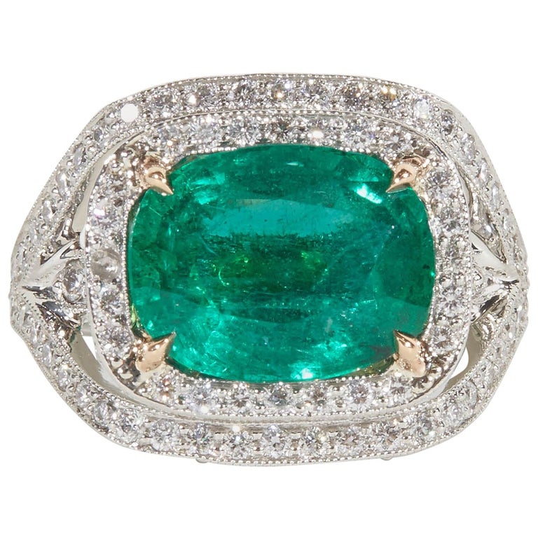 https://a.1stdibscdn.com/emerald-and-diamond-ring-for-sale/1121189/j_33909831595578258090/3390983_master.jpg?width=768