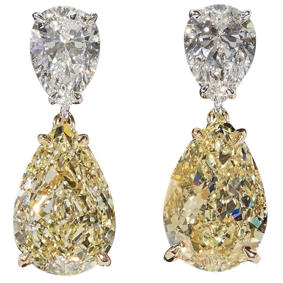 https://a.1stdibscdn.com/gia-yellow-and-white-diamond-earrings-for-sale/366869/j_35539711564496622074/3553971_org_master.jpg