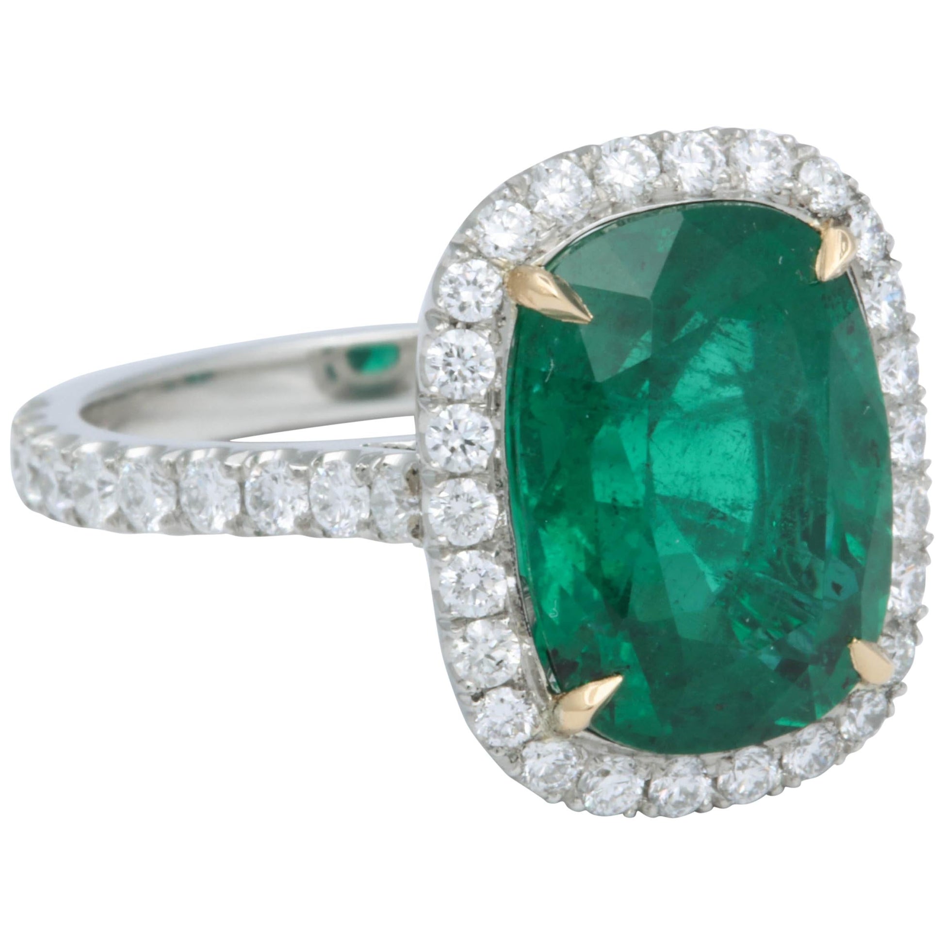 https://a.1stdibscdn.com/5-carat-green-emerald-cushion-cut-diamond-halo-ring-gia-certified-no-oil-for-sale/1121189/j_48413131540622719134/4841313_master.jpg