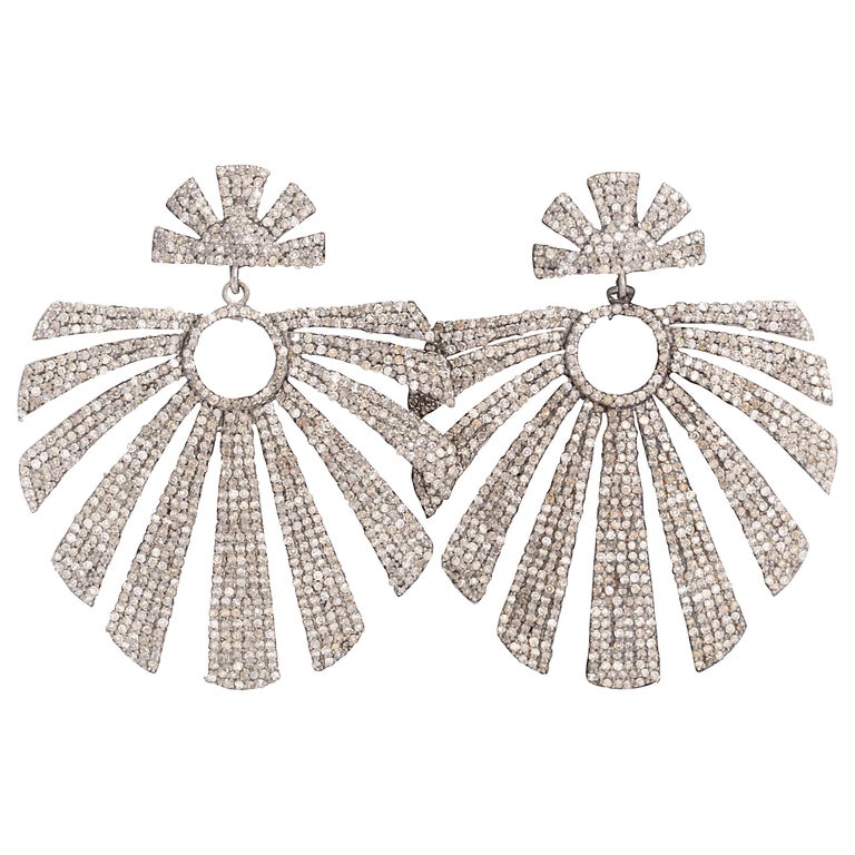 https://a.1stdibscdn.com/diamond-fashion-dangle-earrings-for-sale/1121189/j_54005021548863070245/5400502_master.jpg?width=768