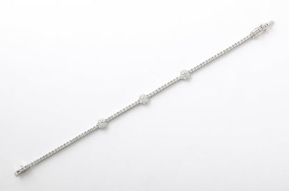 https://a.1stdibscdn.com/flower-diamond-tennis-bracelet-for-sale-picture-2/j_415/j_216140721705596565185/6R1A0161_master.jpg?width=768