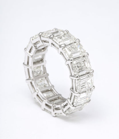 https://a.1stdibscdn.com/13-carat-emerald-cut-diamond-eternity-band-for-sale-picture-6/j_415/j_124610321622814952110/6R1A0378_master.jpg?width=768
