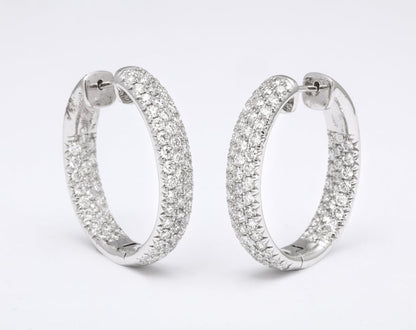 https://a.1stdibscdn.com/pave-diamond-oval-hoop-earrings-for-sale-picture-10/j_415/j_124611321622815570659/6R1A0541_master.jpg?width=768